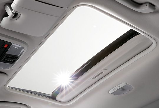 Power-sliding, Tilt-adjustable Glass Sunroof*